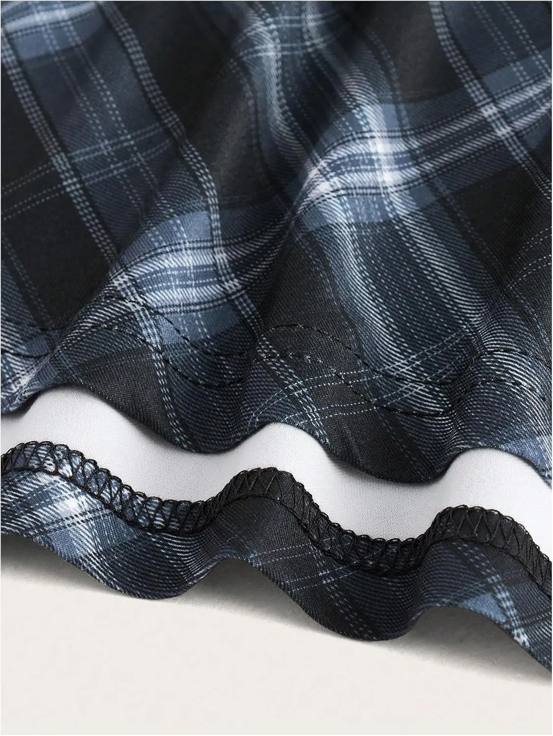 WDIRARA Women's Plaid Spaghetti Strap Cami Dress Sleeveless Flared Hem Mini Dress